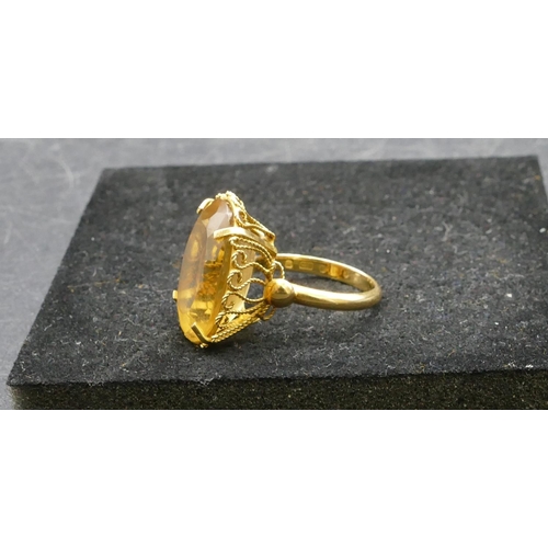 410 - A ladies gold oval citrine ring, Size Q, 8.4 grams gross