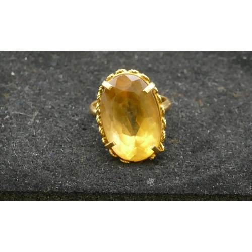 410 - A ladies gold oval citrine ring, Size Q, 8.4 grams gross