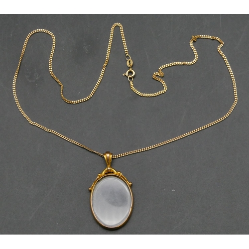 421 - A 9ct gold oval double-sided pendant with glass front and back, 9ct gold flat-linked chain, 46.5cm l... 