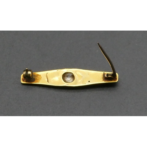 451 - A gold bar brooch set with centre diamond approx. 0.30ct, 4cm long, 5.2 grams gross.