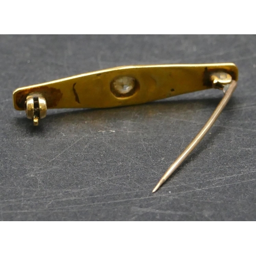 451 - A gold bar brooch set with centre diamond approx. 0.30ct, 4cm long, 5.2 grams gross.