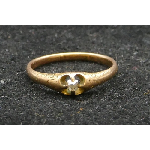 456 - A gold small solitaire diamond ring, size N, 2 grams gross.