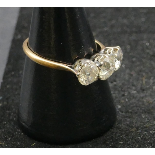 471 - An 18ct gold ladies 3-stone diamond ring, centre diamond approx. 0.80ct, flanked by 2 further diamon... 