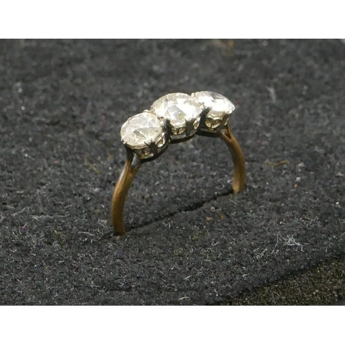 471 - An 18ct gold ladies 3-stone diamond ring, centre diamond approx. 0.80ct, flanked by 2 further diamon... 