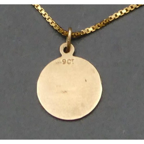 486 - An 18ct gold square linked chain, 60cm long, mounted with 9ct gold circular pendant, 8 grams gross.