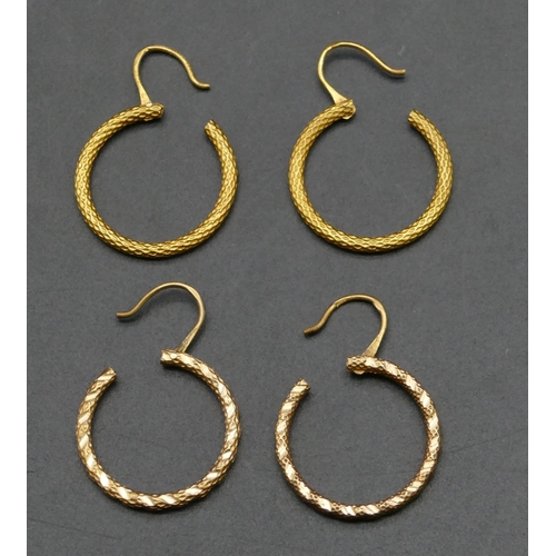 489 - 2 pairs of high carat gold Eastern hoop earrings, 2.5cm diameter, 6.4 grams.