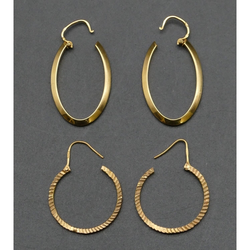 490 - A pair of oval high carat gold hoop earrings and a similar circular pair of high carat gold hoop ear... 