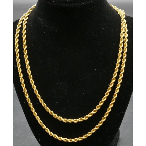 495 - An 18ct gold rope linked necklace, 73cm long, 32.6 grams.