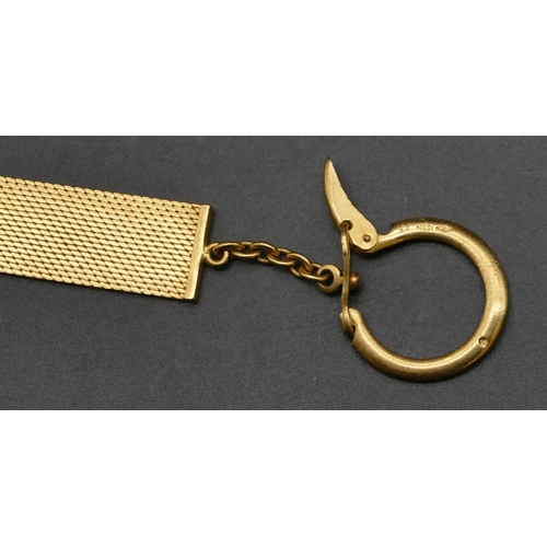 496 - An 18ct gold keyring with chased decoration, mounted with 18ct gold St. Christopher, 13.5cm long ove... 