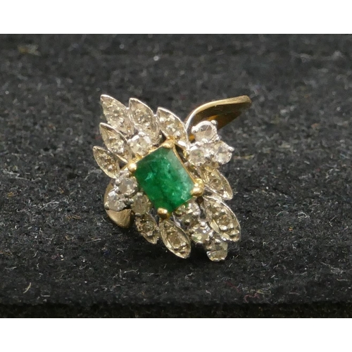 500 - A high carat yellow gold cluster ring set with centre emerald and surrounded by small diamonds, size... 