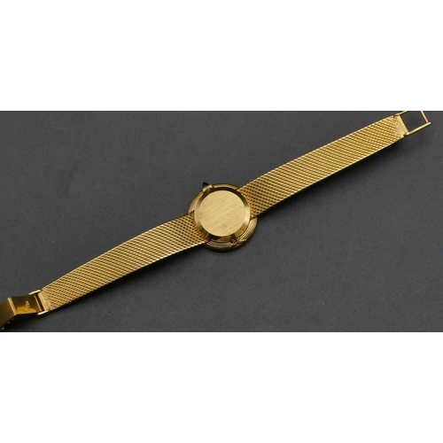 503 - An 18ct gold Khalid ladies circular wristwatch mounted with 2 diamonds, matching strap bracelet, 16.... 