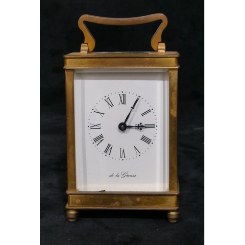 694 - Dee La Grense, Oxford, brass carriage clock numbered 695, white enamel dial with Roman numerals, swi... 