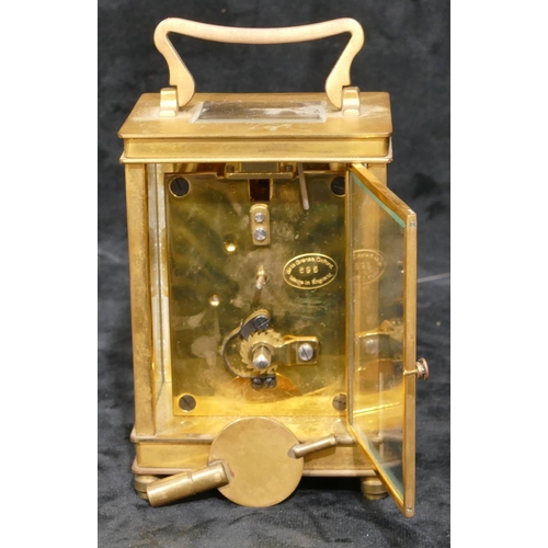 694 - Dee La Grense, Oxford, brass carriage clock numbered 695, white enamel dial with Roman numerals, swi... 