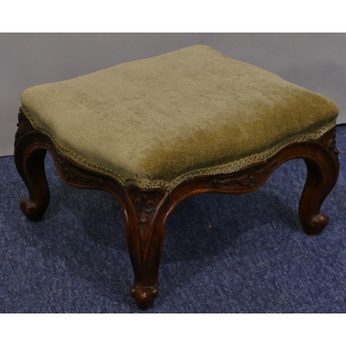 700 - A Victorian walnut rectangular scallop shaped footstool with green velvet overstuffed seat, carved f... 