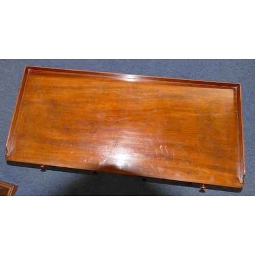 706 - A 19th Century mahogany side table with lipped back, 2 drawers with wood knob handles, round turned ... 