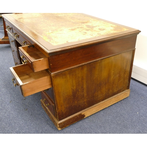 707 - A Maple & Co mahogany partners desk with brown leather inset top, centre drawer flanked by 8 short g... 