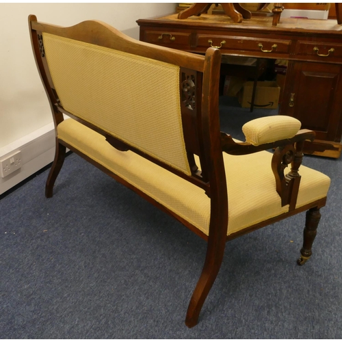 710 - An Edwardian mahogany 2-seater settee with inlaid shell, floral, leaf and stringing decoration, yell... 