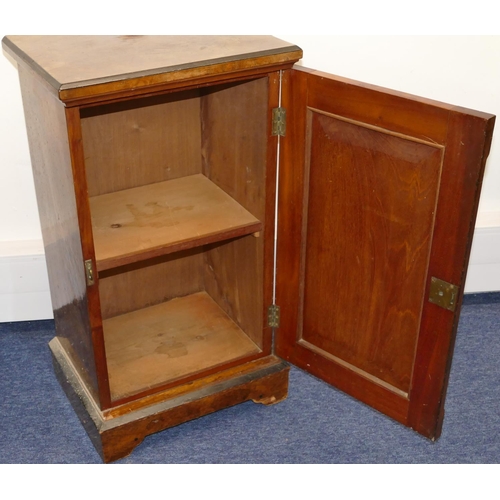 719 - A Victorian burr walnut bedside cupboard with ebonised decoration, single panel door enclosing shelf... 