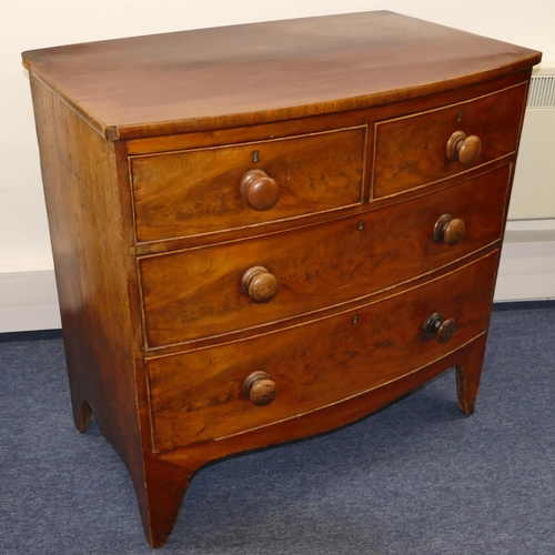 722 - A 19th Century mahogany small bow fronted chest of drawers with 2 short, 2 long graduated drawers wi... 