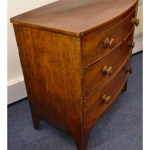 722 - A 19th Century mahogany small bow fronted chest of drawers with 2 short, 2 long graduated drawers wi... 