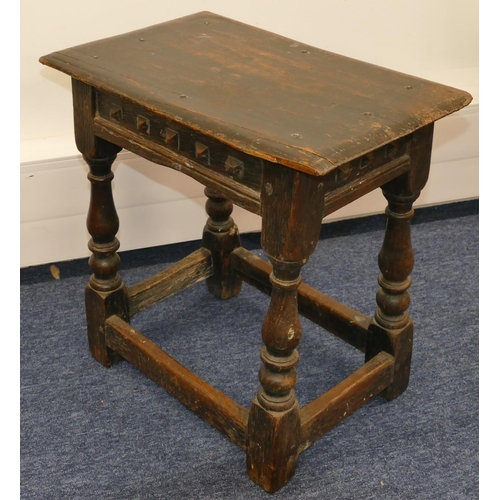 723 - An early oak joint stool with raised studded frieze, on round turned legs with stretchers, 45.5cm wi... 