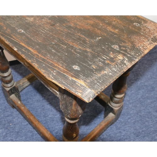 723 - An early oak joint stool with raised studded frieze, on round turned legs with stretchers, 45.5cm wi... 