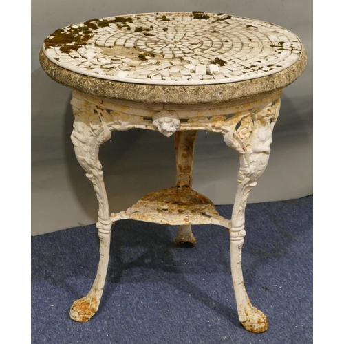 747 - A Victorian white painted cast iron garden table with 3 splayed figurehead legs with claw feet, allo... 