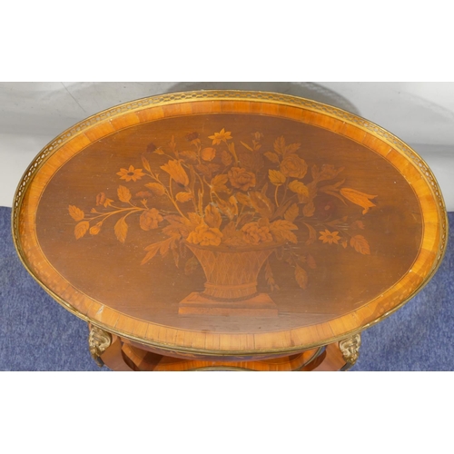 748 - A 19th Century oval marquetry side table with pierced gilt and metal gallery top, marquetry vase, fl... 