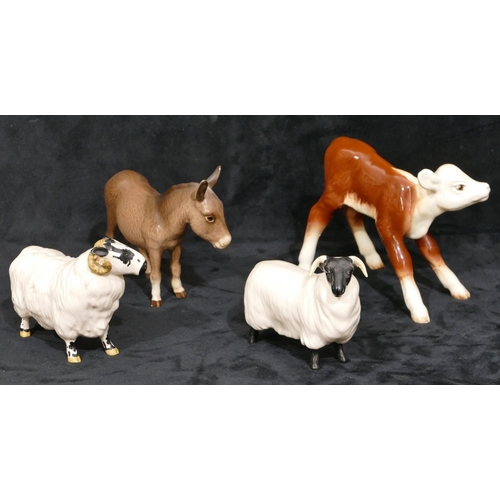 79 - A Beswick figure of a donkey, a Beswick figure of a ram, 8.5cm high, a similar figure of a sheep and... 