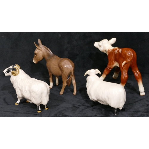 79 - A Beswick figure of a donkey, a Beswick figure of a ram, 8.5cm high, a similar figure of a sheep and... 