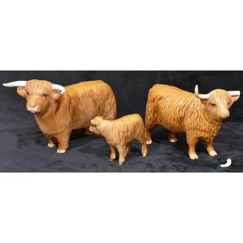 83 - A Beswick Highland bull with cow (Horn in need of restoration) and calf. (3)