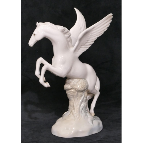 93 - A Spanish china figure of a white winged horse, 26.5cm high