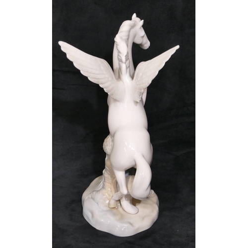 93 - A Spanish china figure of a white winged horse, 26.5cm high