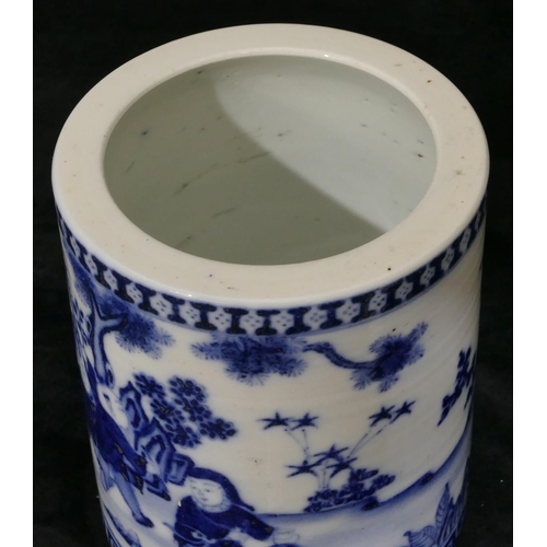 99 - An Oriental blue and white cylindrical brush pot depicting children playing in garden, 16cm high