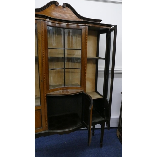 712 - An Edwardian mahogany display cabinet with swan necked top, allover inlaid boxing and stringing, con... 