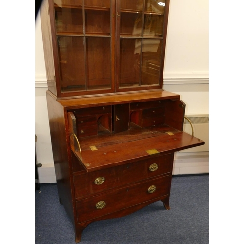 726 - A George III small mahogany secretaire bookcase with 2 astrical glazed doors enclosing adjustable sh... 