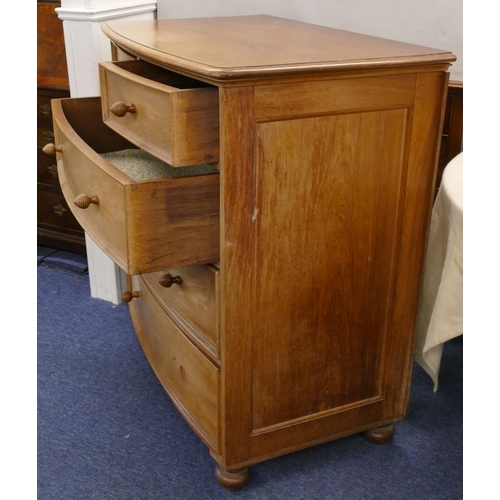 754 - A mahogany bow front chest of drawers, 2 small and 3 long drawers with wood knob handles and on turn... 