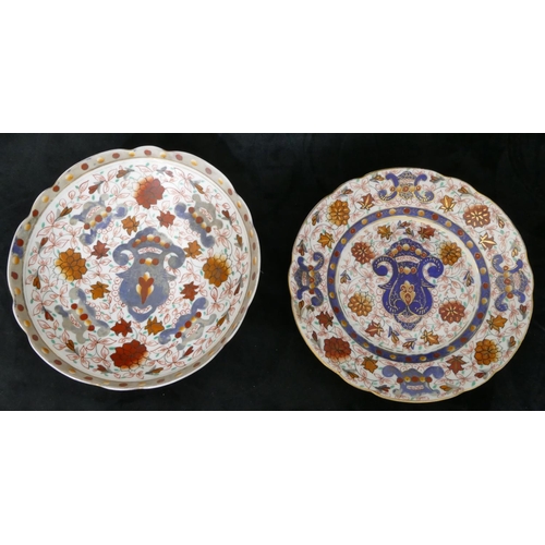 86 - A Continental porcelain fruit service with round scallop shaped comport on white and blue ground wit... 