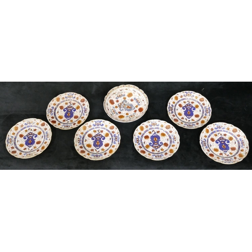 86 - A Continental porcelain fruit service with round scallop shaped comport on white and blue ground wit... 