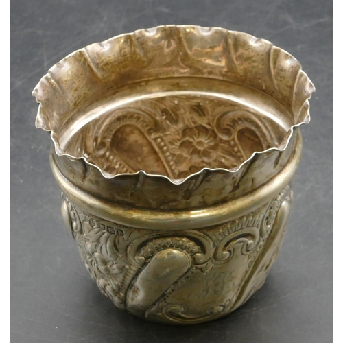 301 - A Victorian silver round trumpet shaped jardiniere with crinkled rim, embossed floral, leaf and scro... 