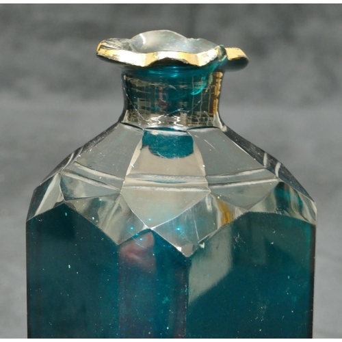 143 - A set of 3 19th Century cut glass turquoise green decanters with chamfer corners, all with stoppers ... 