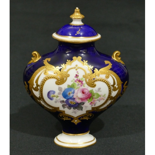 146 - A Royal Crown Derby miniature bulbous thin necked 2-handled lidded vase on Royal blue ground and han... 