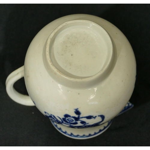 147 - An 18th Century Worcester blue and white round bulbous sparrow beak jug with floral and insect decor... 