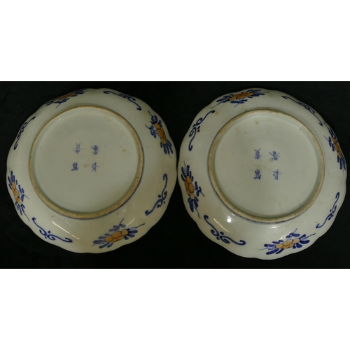 149 - A pair of 19/20th Century Imari round scallop shaped plates on white, red and blue ground with colou... 