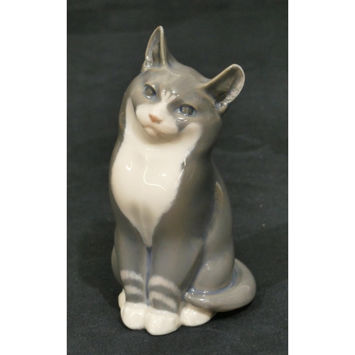 176 - A Royal Copenhagen figure of a seated cat 5081, 13cm high