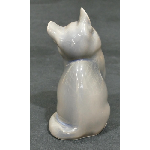 176 - A Royal Copenhagen figure of a seated cat 5081, 13cm high