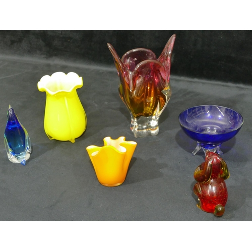 179 - A heavy yellow and red glass square bulbous shaped vase with crinkled rim, 24cm high, a yellow glass... 