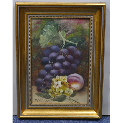 188 - Oil on board still life of grapes and peach, indistinctly signed, in gilt frame, 29.5 x 19cm.