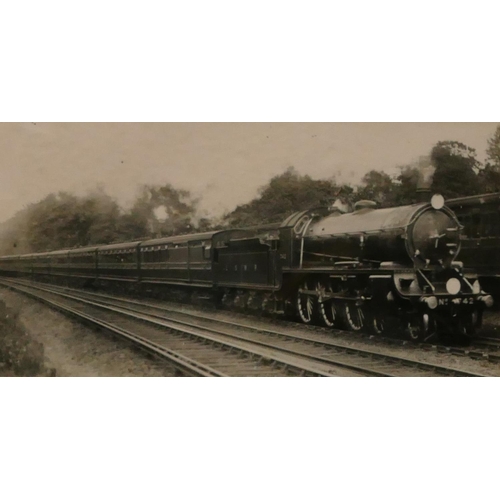 197 - A black and white photograph of a steam engine 