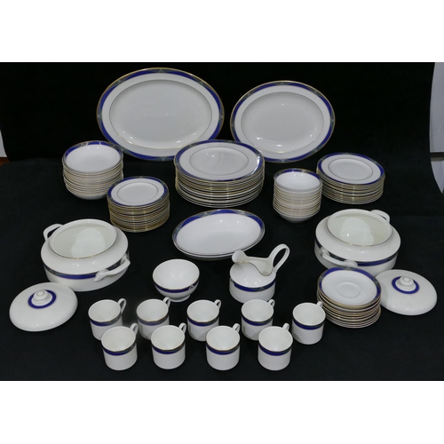 32 - A Royal Doulton Regalia dinner service on white and blue ground, 2 graduated meat plates, a pair of ... 